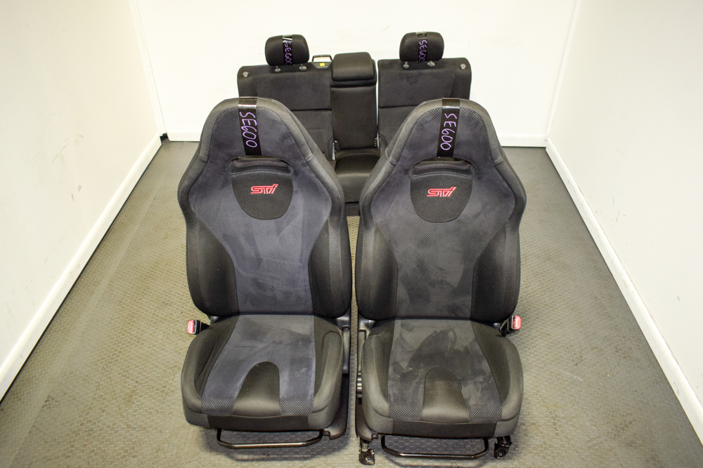 08 JDM Forester STI Black Alcantara front seats with rear foldable seats.